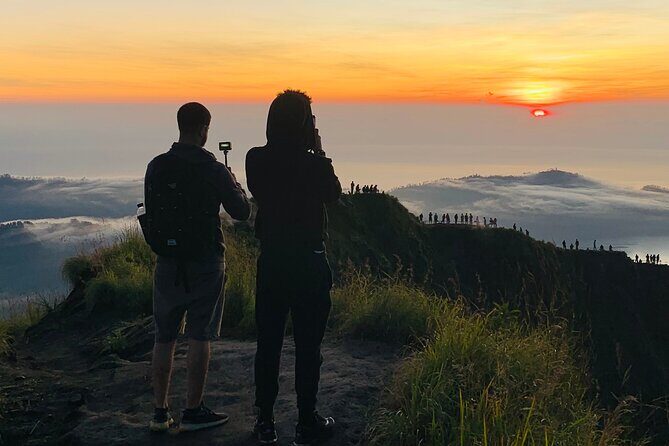 Mount Batur Sunrise Hike And Natural Hot Spring - The climb in the dark: flashlight, poles, and a steady pace