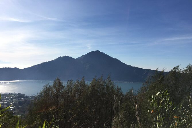 Mount Batur Sunrise Trekking & Hot Spring Tour - Sunrise on the ridge: breakfast, photos, and that wait