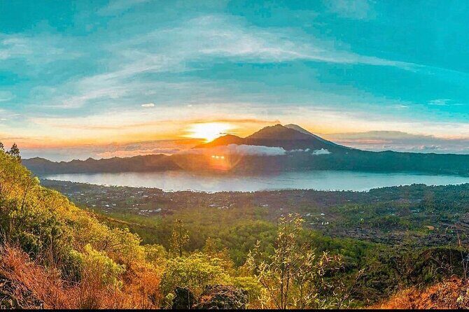 Sharing Mount Batur Sunrise Trekking Guide Pick Up and Drop Off - After Sunrise: Continuing the Trek Around the Crater